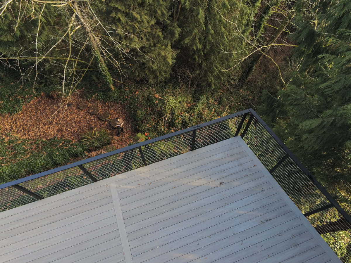 Bellevue high balcony deck construction finished looking down from cable railing