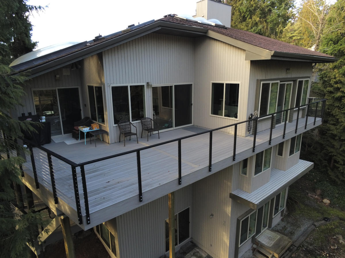Bellevue high balcony deck construction full view cable railing outdoor living space