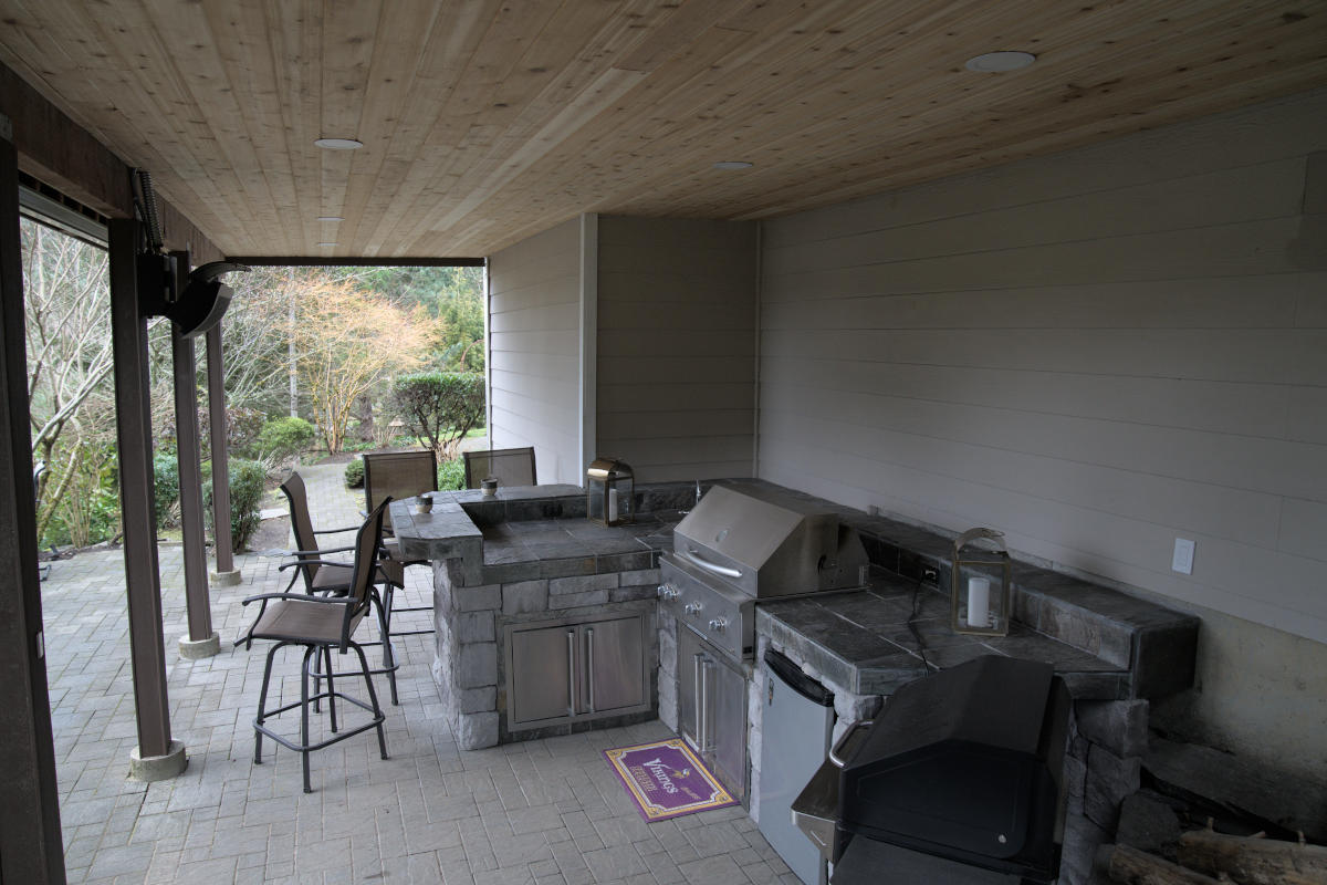 Redmond deck balcony build with covered under deck outdoor bar and grill space