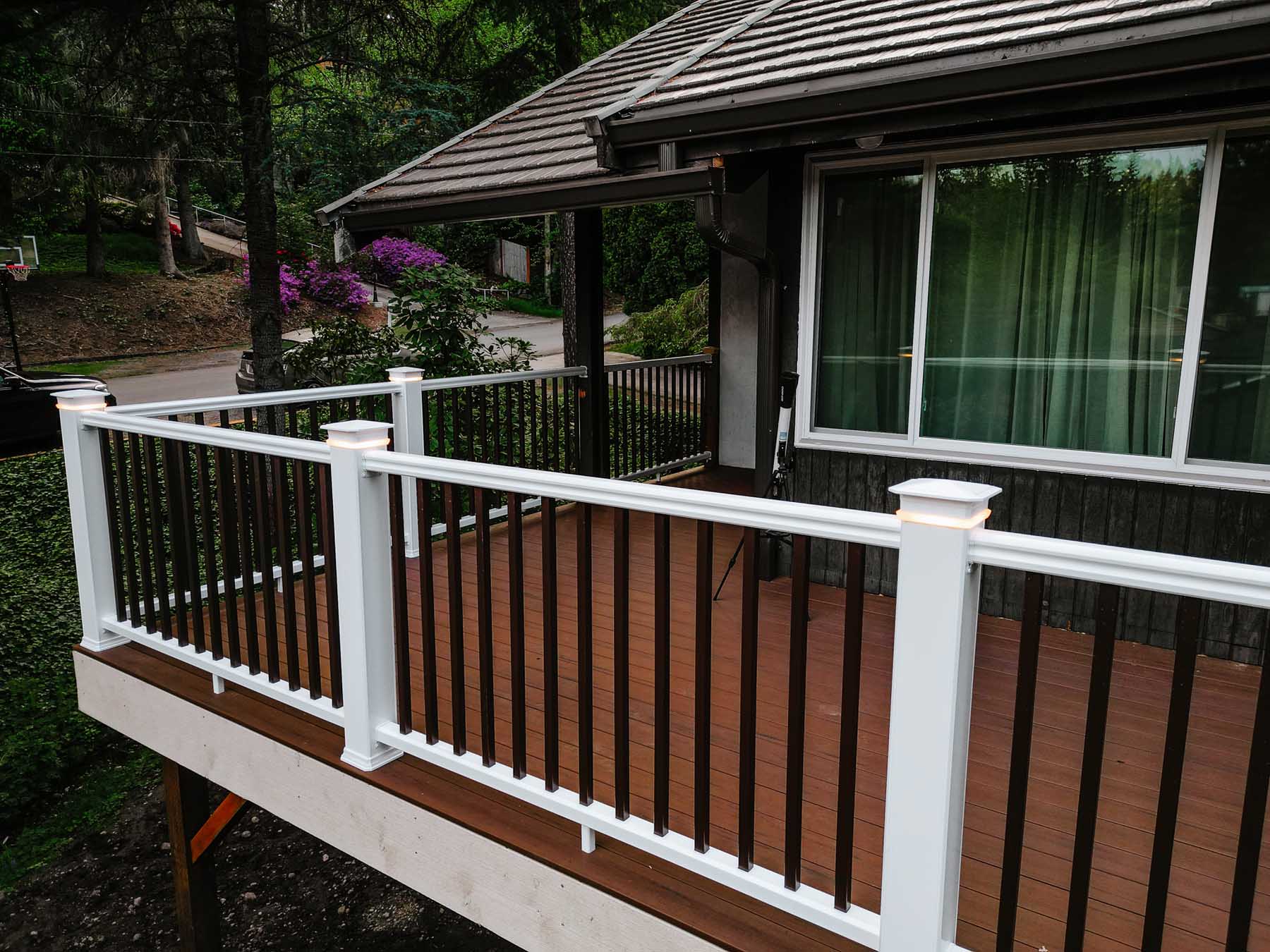 Picket railing with embedded lighting on composite decking | 3 Brothers ...